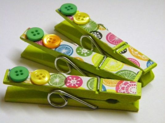 Attach a foam sheet or carved linoleum block to a clothespi