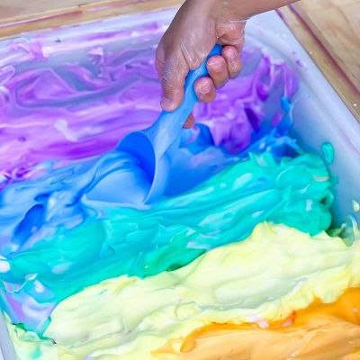Create a sensory bin filled with shaving cream