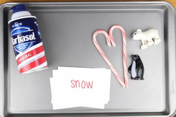 Spread shaving cream on a tray or cookie sheet