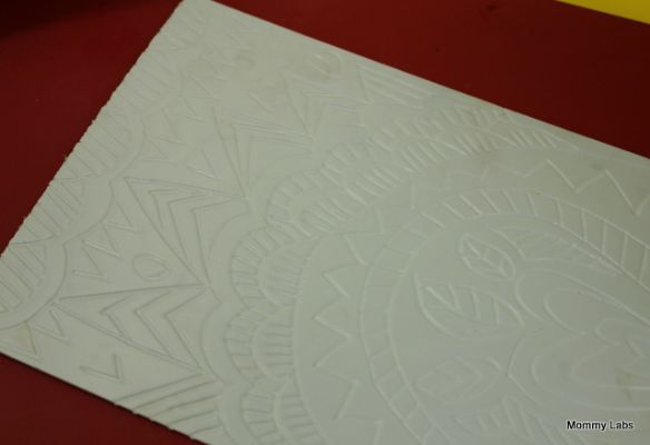kids use leaves as stamps