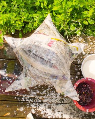 special occasion by making a piñata using newspaper